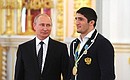 With Olympic freestyle wrestling champion Abdulrashid Sadulayev.