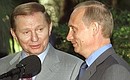 President Putin with Ukrainian President Leonid Kuchma at a joint press conference.