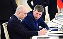 Finance Minister Anton Siluanov (left) and Minister of Economic Development Maxim Reshetnikov before the meeting of the Supreme State Council of the Union State.