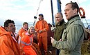 With Prime Minster Dmitry Medvedev in a fishing boat on Lake Ilmen.
