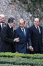 President Putin before the plenary meeting of the Russia-European Union summit with European Commission President Romano Prodi and Italian Prime Minister Silvio Berlusconi, right.