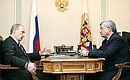 With Semyon Vainshtok, president of the federal corporation involved in building the 2014 Olympic facilities and creating a mountain resort in Sochi.
