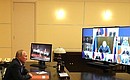At the meeting with permanent members of Security Council (via videoconference).