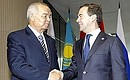 With President of Uzbekistan Islam Karimov before the start of the Shanghai Cooperation Organisation Council of Heads of State meeting in restricted format attended by heads of SCO observer countries. 