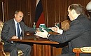 С председателем Центральной избирательной комиссии Александром Вешняковым.