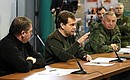 At the meeting with participants in the assembly of commanders of the Armed Forces formations. With Defence Minister Anatoly Serdyukov (left) and Chief of the General Staff of the Russian Armed Forces Gen. Nikolai Makarov.