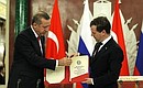 With Prime Minister of Turkey Recep Tayyip Erdogan after the joint news conference following meeting of High-Level Russian-Turkish Cooperation Council. Recep Tayyip Erdogan presented Dmitry Medvedev a replica of the Treaty of Friendship and Brotherhood between Turkey and Russia signed on March 16, 1921 in Moscow, and a commemorative stamp in honour of the 90th anniversary of the document’s signing.