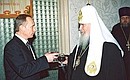На торжественном приеме по случаю дня тезоименитства Патриарха Московского и всея Руси Алексия II.