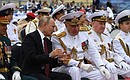 With Navy Commander-in-Chief Nikolai Yevmenov during the Main Naval Parade. Photo: RIA Novosti