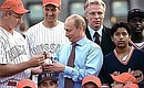 COLUMBIA UNIVERSITY. President Putin with members and coaches of the Russian and American children\'s baseball teams. 