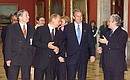 President Putin with US President George Bush and Hermitage director Mikhail Piotrovsky (right) looking at the exhibits.