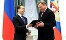 Dmitry Medvedev presents the appreciation letter to Vladislav Tretyak, Merited Sports Master of the USSR.