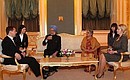 Dmitry and Sevtlana Medvedev meeting Prime Minister of India Manmohan Singh and his spouse Gursharan Kaur.