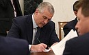 Head of the Republic of Crimea Sergei Aksyonov prior to the meeting with Government members.