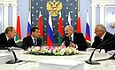 At a meeting of the Supreme State Council of the Union State. From left to right: Prime Minister of Russia Vladimir Putin, Dmitry Medvedev, President of Belarus Alexander Lukashenko, and Prime Minister of Belarus Mikhail Myasnikovich.