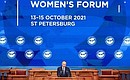 Vladimir Putin took part in the opening of the third Eurasian Women’s Forum. Photo: TASS