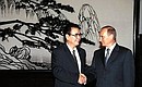 С Председателем Постоянного Комитета Всекитайского Собрания Народных Представителей Ли Пэном.