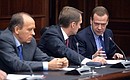 Federal Security Service Director Alexander Bortnikov, Sate Duma Speaker Sergei Naryshkin and Prime Minister Dmitry Medvedev before a meeting with permanent members of the Security Council.