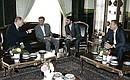 С Президентом Ирана Махмудом Ахмадинежадом. Справа – Президент Азербайджана Ильхам Алиев.