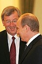 С Премьер–министром Люксембурга Жан-Клодом Юнкером.