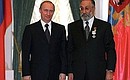 Владимир Путин вручил заместителю Председателя Государственной Думы Артуру Чилингарову орден «За морские заслуги».