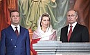 At the divine Easter service at the Christ the Saviour Cathedral. With Prime Minister Dmitry Medvedev and his wife Svetlana Medvedeva.