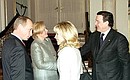 President Putin and his wife Lyudmila with German Federal Chancellor Gerhard Schroeder and his wife Doris Schroeder-Koepf.
