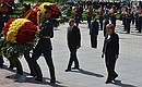 Vladimir Putin and Federal Chancellor of Germany Angela Merkel laid wreaths at the Tomb of the Unknown Soldier in the Alexander Garden.