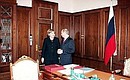 With Federal Chancellor of Germany Angela Merkel in the President\'s working office.