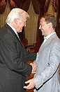 С вице-канцлером, министром иностранных дел Германии Франком-Вальтером Штайнмайером.