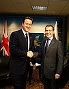 With UK Prime Minister David Cameron.