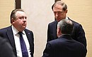 President of the United Shipbuilding Corporation Alexei Rakhmanov, left, and Minister of Industry and Trade Denis Manturov before the meeting with senior Defence Ministry officials and defence industry executives on the implementation of the state defence order for the Navy.