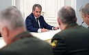 At the meeting with Defence Ministry officials. Defence Minister Sergei Shoigu.