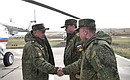 Defence Minister Sergei Shoigu, left, Chief of the General Staff of Russia’s Armed Forces, First Deputy Defence Minister Valery Gerasimov and Commander of the Eastern Military District Alexander Zhuravlyov, right, at Vostok-2018 military manoeuvres.