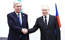 С Президентом Казахстана Касым-Жомартом Токаевым. Фото: Сергей Бобылёв, ТАСС