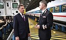 Transport Minister Maxim Sokolov (left) and Russian Railways CEO Oleg Belozerov.
