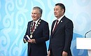 Ceremony for presenting the Honourary Badge of the Commonwealth of Independent States by President of Kyrgyzstan Sadyr Japarov to President of Uzbekistan Shavkat Mirziyoyev. Photo: Sergei Karpukhin, TASS