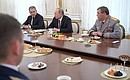 At a ceremony presenting state decorations. Drinking tea with Special Operations Force officers decorated for their services in fighting terrorists in Syria. Also attending were Defence Minister Sergei Shoigu (left) and Chief of Armed Forces General Staff and First Deputy Defence Minister Valery Gerasimov.